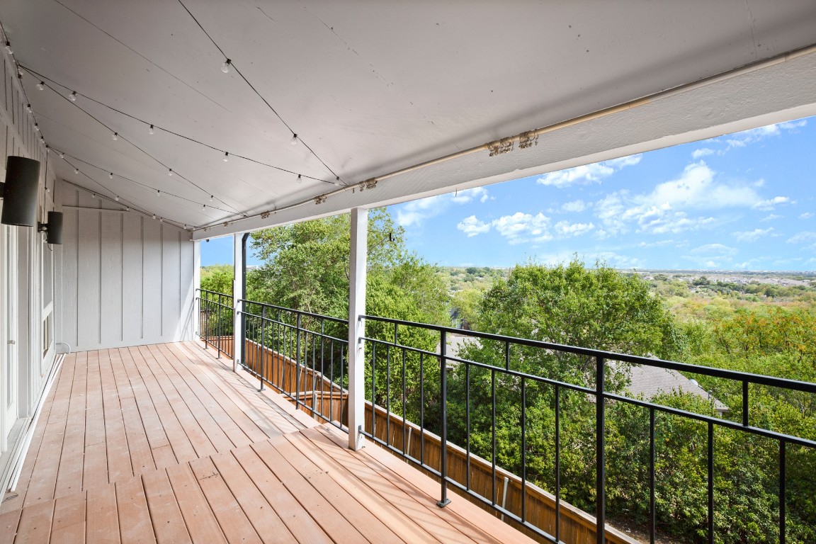 3306 Hyclimb Circle, Unit A Austin, TX 78723 - Photo 25 of 26 a view of a balcony with wooden floor