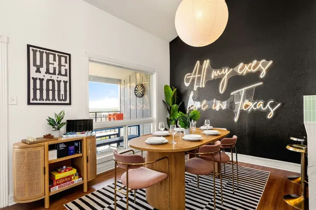 a view of a dining room with furniture