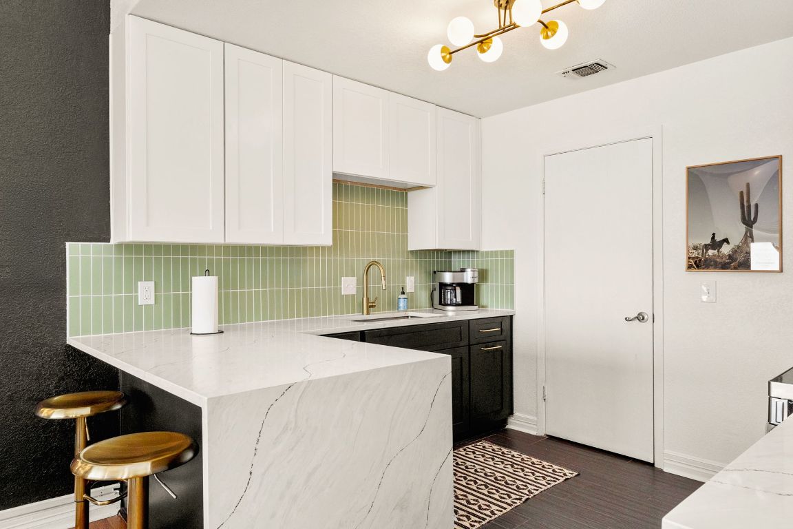 3306 Hyclimb Circle, Unit A Austin, TX 78723 - Photo 5 of 26 a kitchen with a sink cabinets and appliances