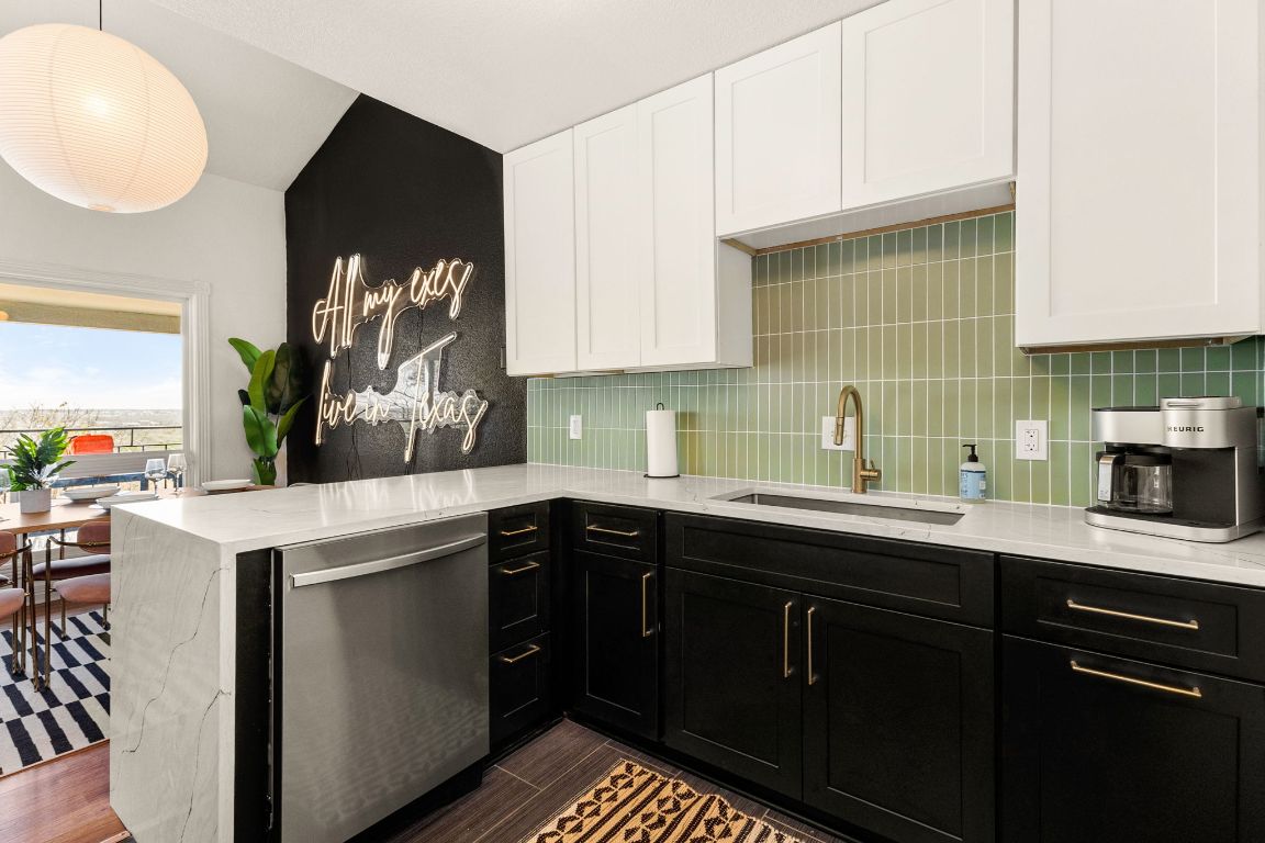 3306 Hyclimb Circle, Unit A Austin, TX 78723 - Photo 6 of 26 a kitchen with a sink and cabinets