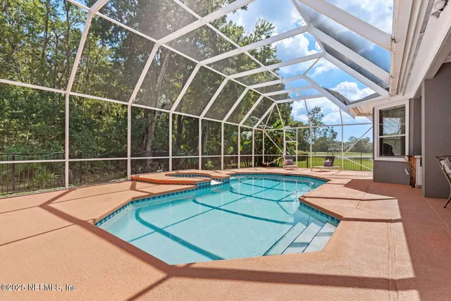 a view of a swimming pool with windows