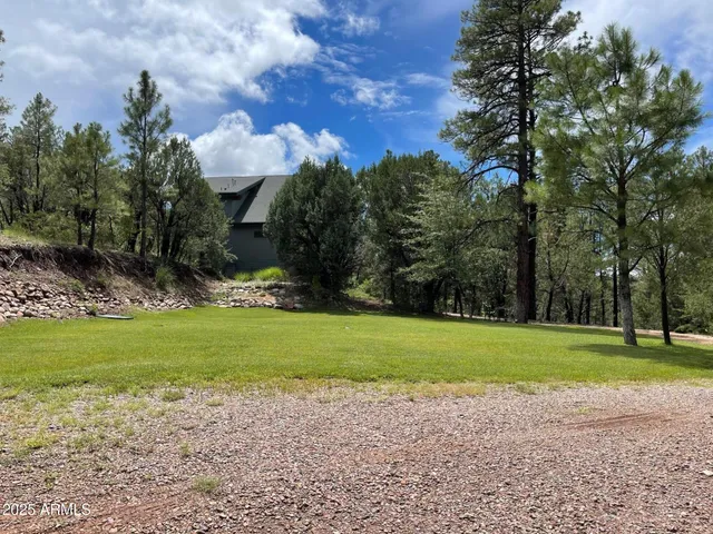 a view of an outdoor space and swimming pool