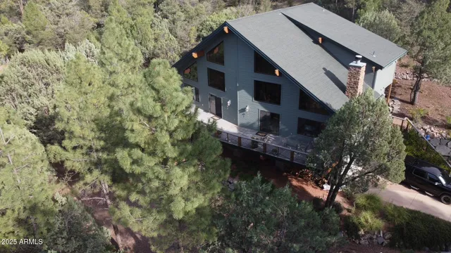 a aerial view of a house with a yard