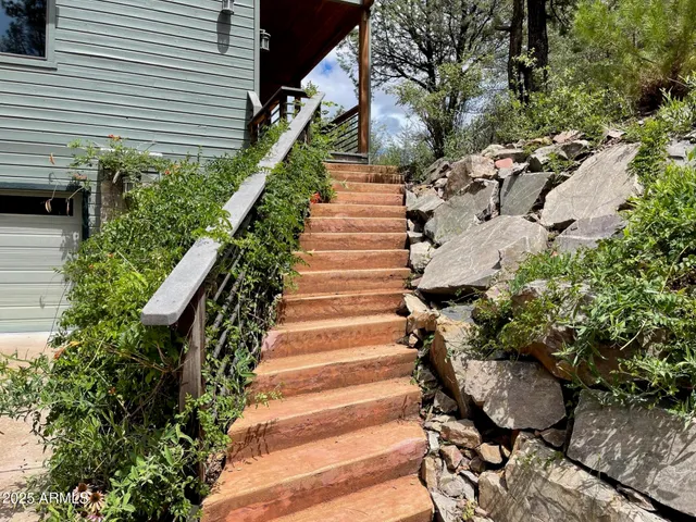 a view of stairs and yard