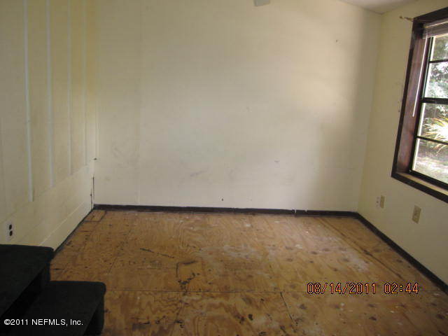 1360 Prince Road St. Augustine, FL 32086 - Photo 5 of 8 an empty room with windows