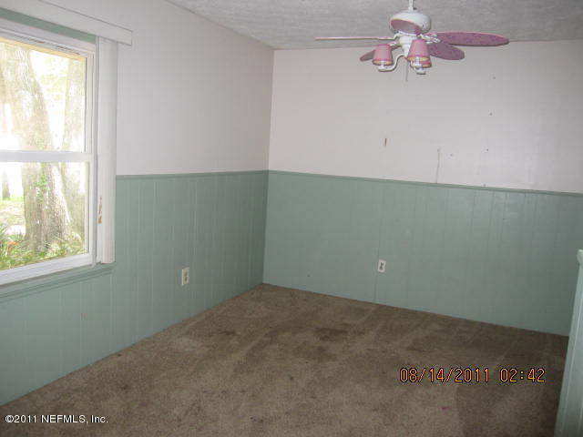 1360 Prince Road St. Augustine, FL 32086 - Photo 6 of 8 an empty room with a window