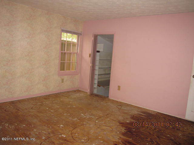 1360 Prince Road St. Augustine, FL 32086 - Photo 7 of 8 an empty room with closet area