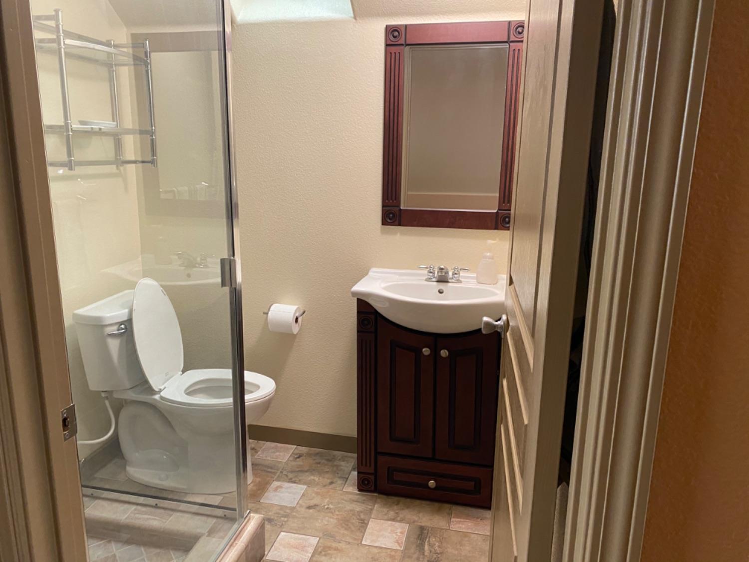 28067 Circle J Ranch Road O'Neals, CA 93645 - Photo 42 of 45 Full Bathroom with shower in loft above garage
