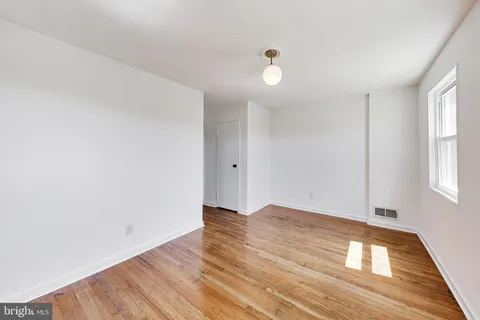 a view of small space with racks on the wall