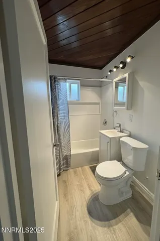 a bathroom with a toilet and a sink
