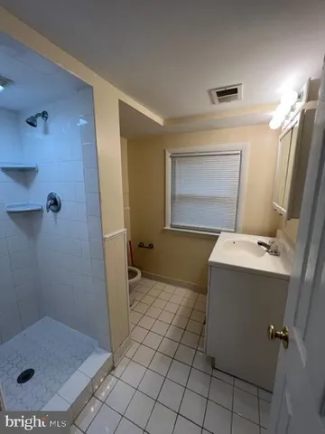 an empty room with a empty space and a window