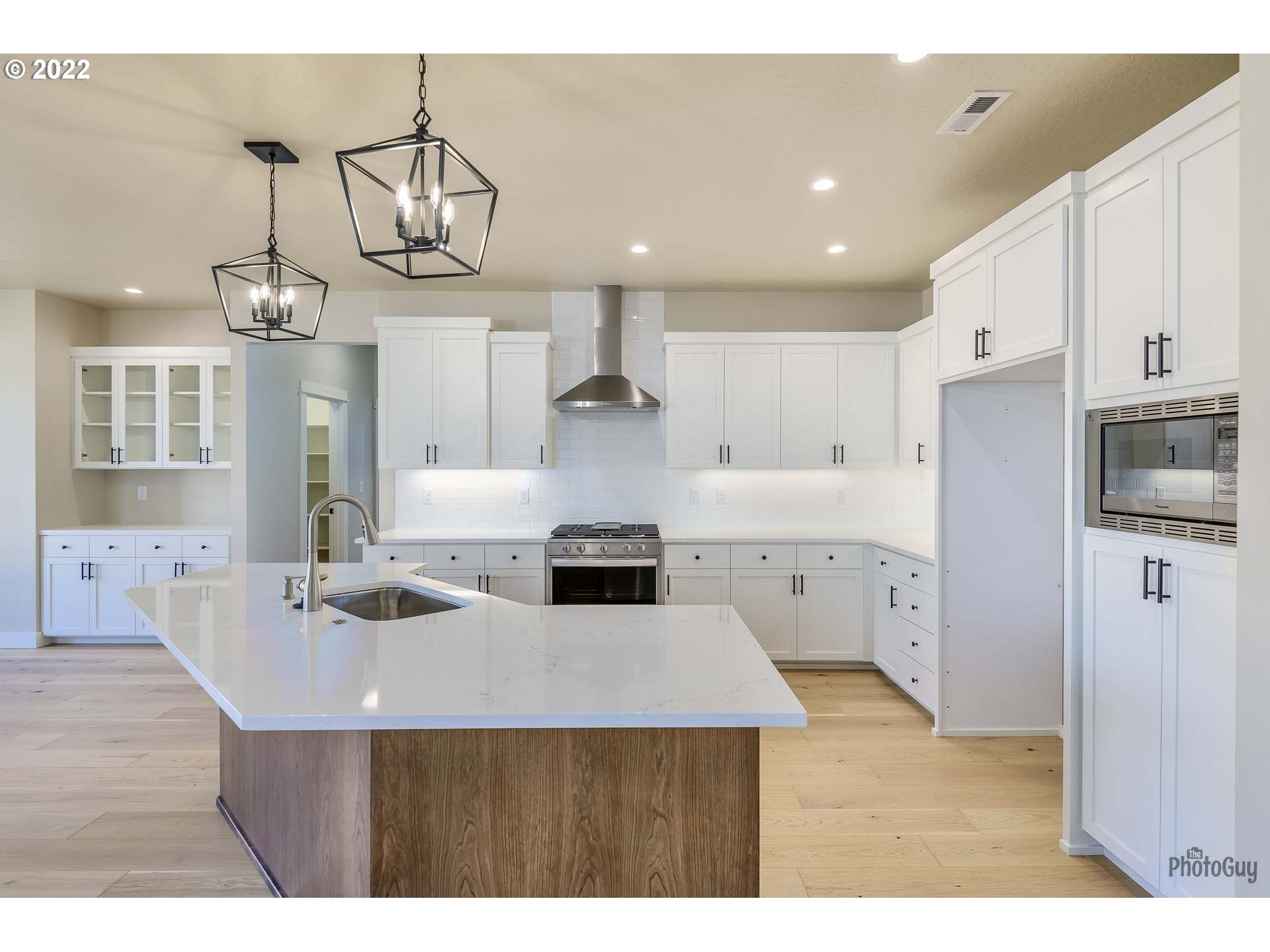 1003 South 33rd Street Springfield, OR 97478 - Photo 14 of 41 a kitchen with cabinets a counter space stainless steel appliances and cabinets