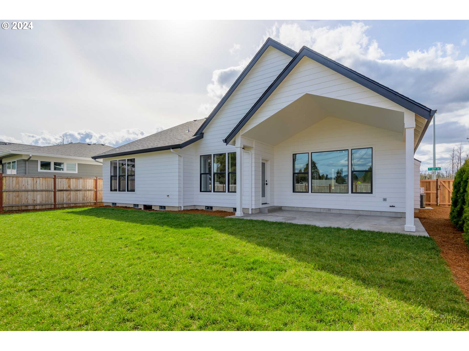 1003 South 33rd Street Springfield, OR 97478 - Photo 41 of 41 a view of a house with a yard and sitting area