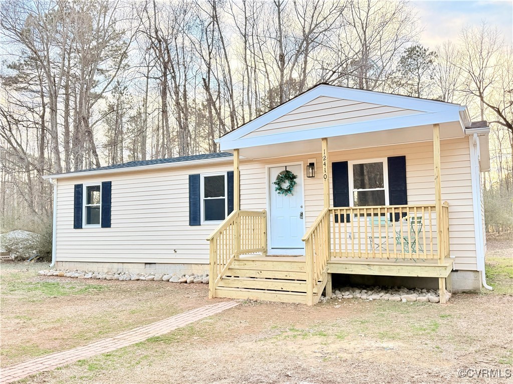 12410 Baltimore Road Ford, VA 23850 - Photo 1 of 11 a view of a house with a yard