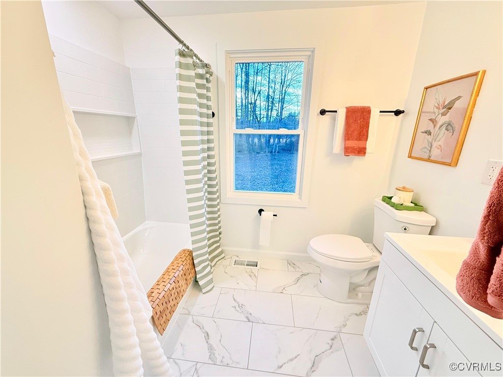 12410 Baltimore Road Ford, VA 23850 - Photo 10 of 11 a bathroom with a sink and toilet