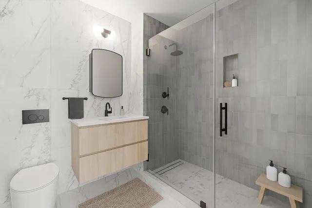 a bedroom with bed and a large window