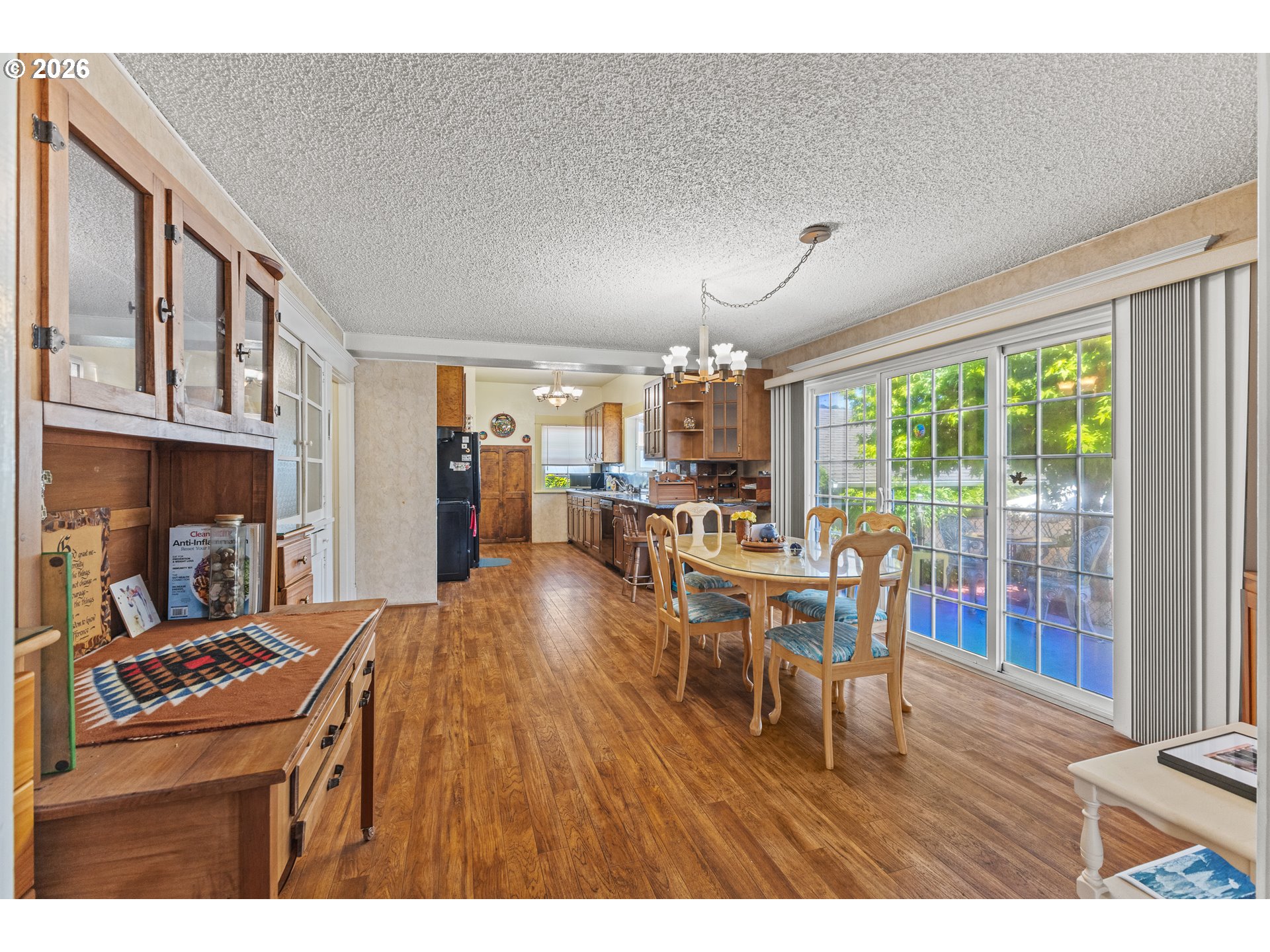 208 7th Street Myrtle Point, OR 97458 - Photo 18 of 48 a dining room with furniture and wooden floor