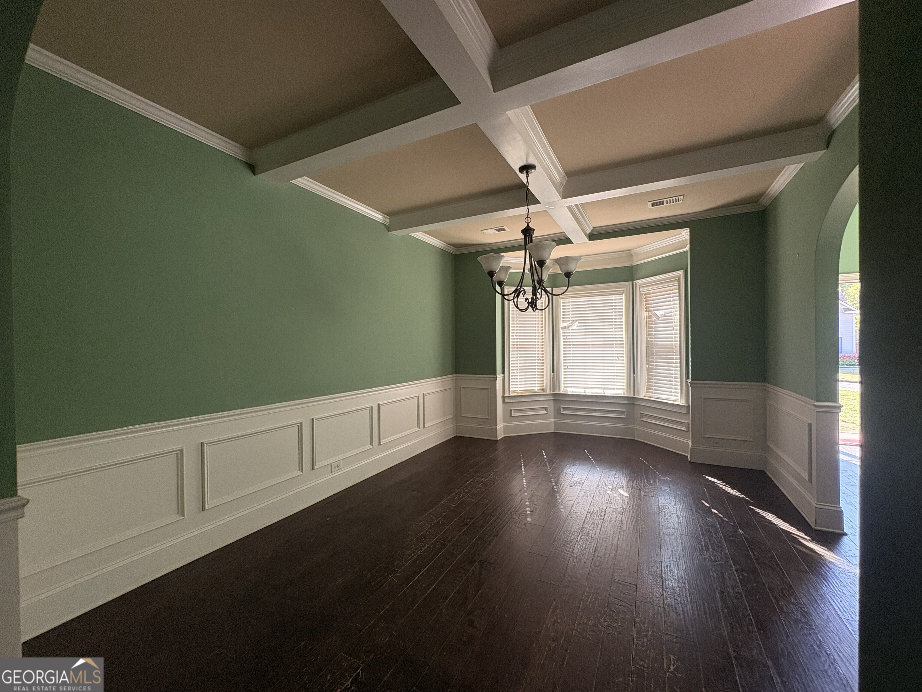 410 Ripsaw Court Grovetown, GA 30813 - Photo 11 of 64 a view of an empty room with wooden floor and a window