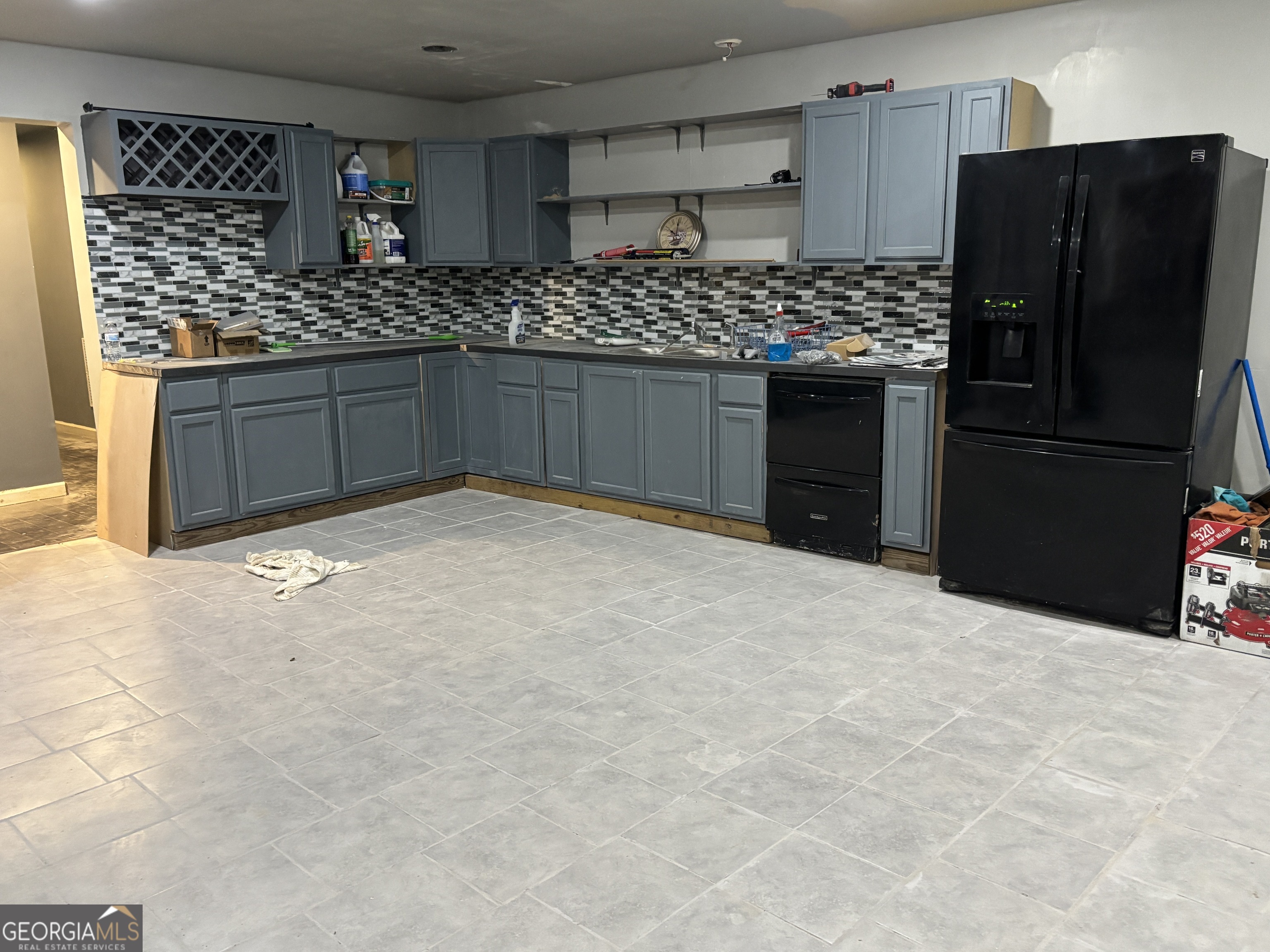 410 Ripsaw Court Grovetown, GA 30813 - Photo 16 of 64 a kitchen with granite countertop a refrigerator and a stove