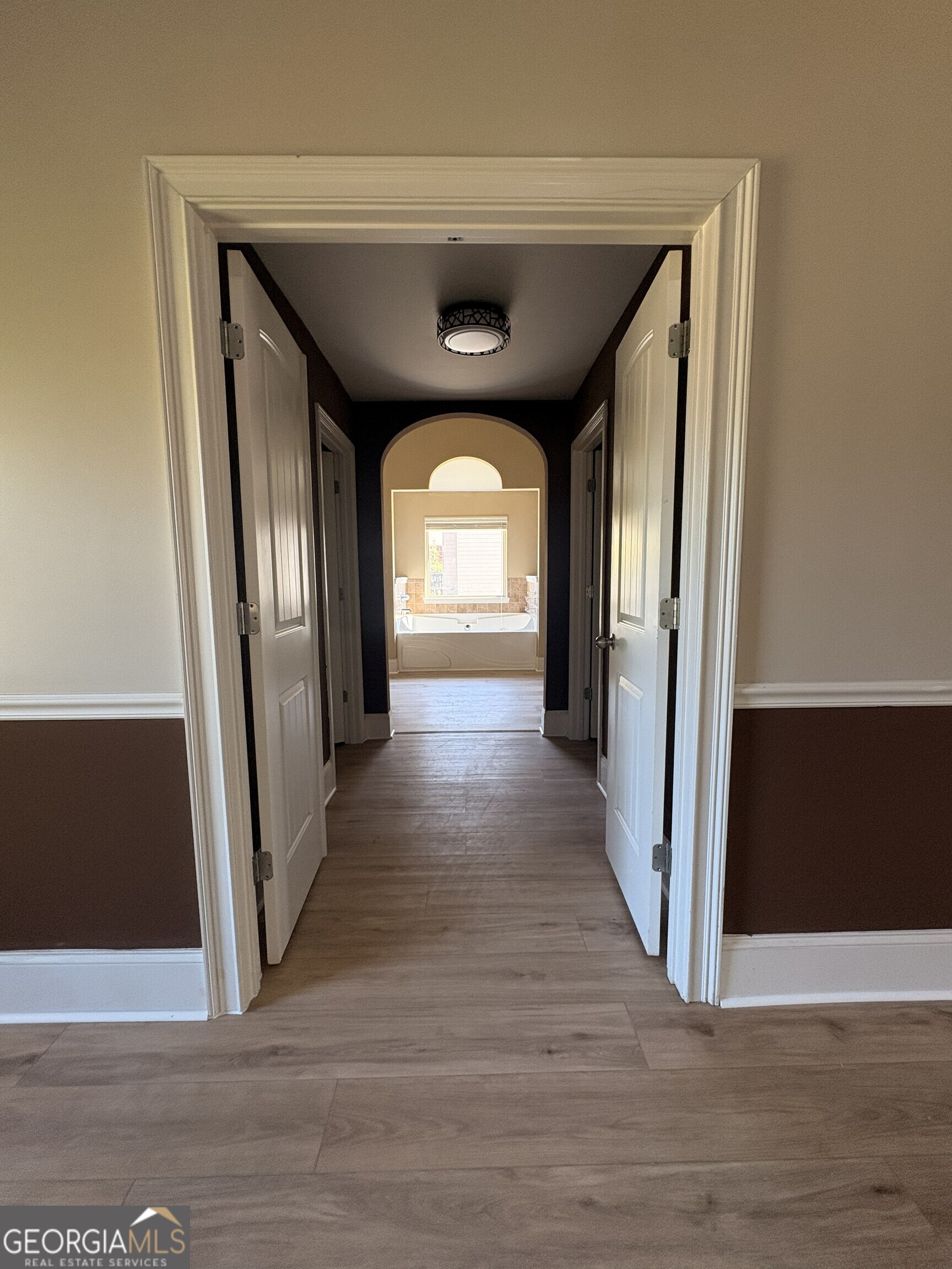 410 Ripsaw Court Grovetown, GA 30813 - Photo 27 of 64 a view of a hallway with wooden floor and staircase