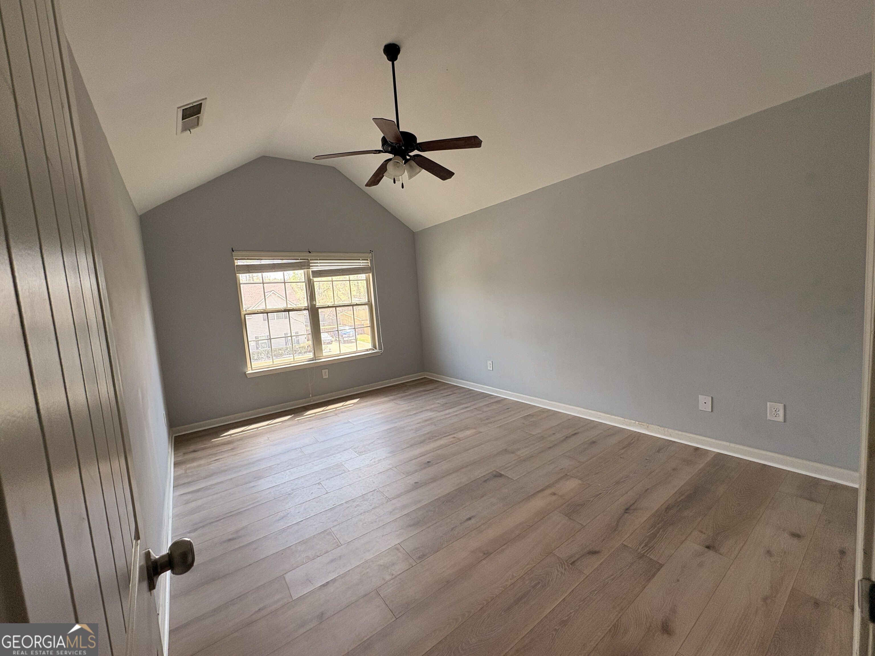 410 Ripsaw Court Grovetown, GA 30813 - Photo 34 of 64 wooden floor in an empty room with a window