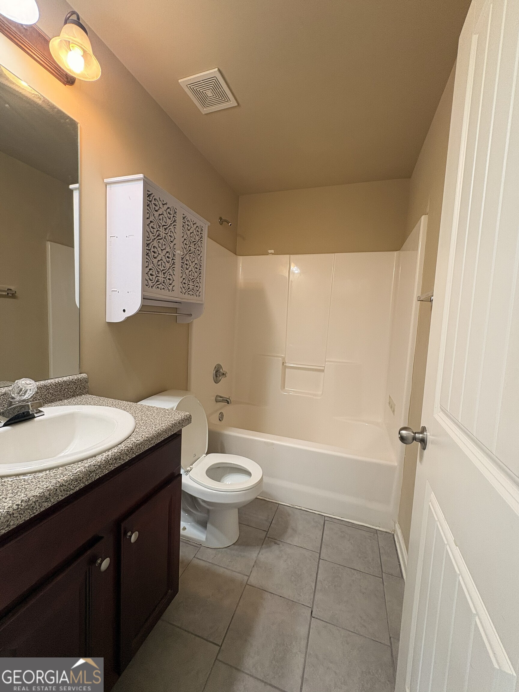 410 Ripsaw Court Grovetown, GA 30813 - Photo 48 of 64 a bathroom with a granite countertop sink toilet and shower