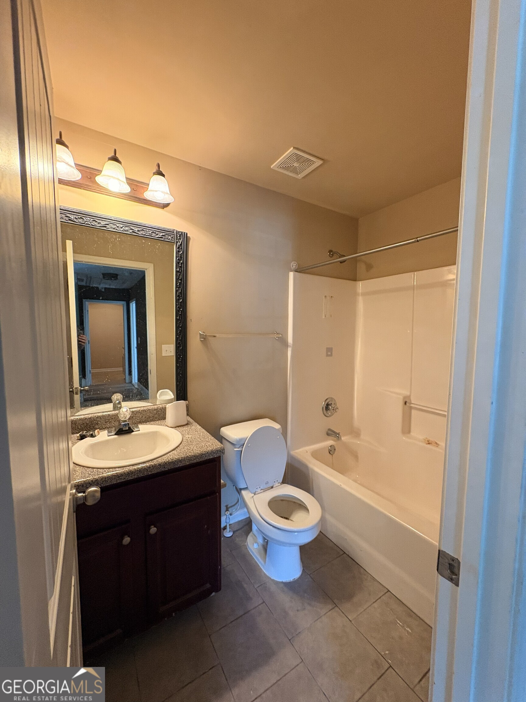 410 Ripsaw Court Grovetown, GA 30813 - Photo 53 of 64 a spacious bathroom with a toilet sink mirror and bathtub
