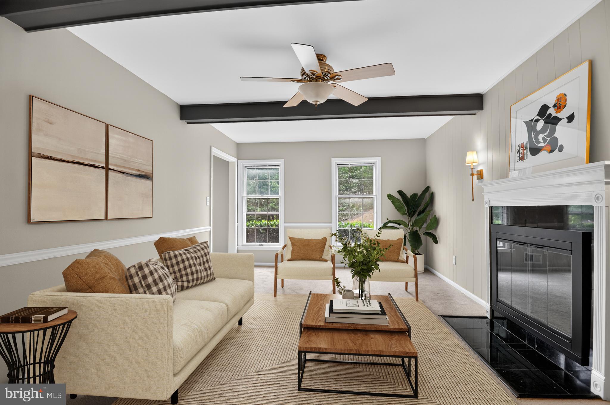 5 Turnham Court Gaithersburg, MD 20878 - Photo 12 of 56 a living room with furniture a chandelier and a flat screen tv