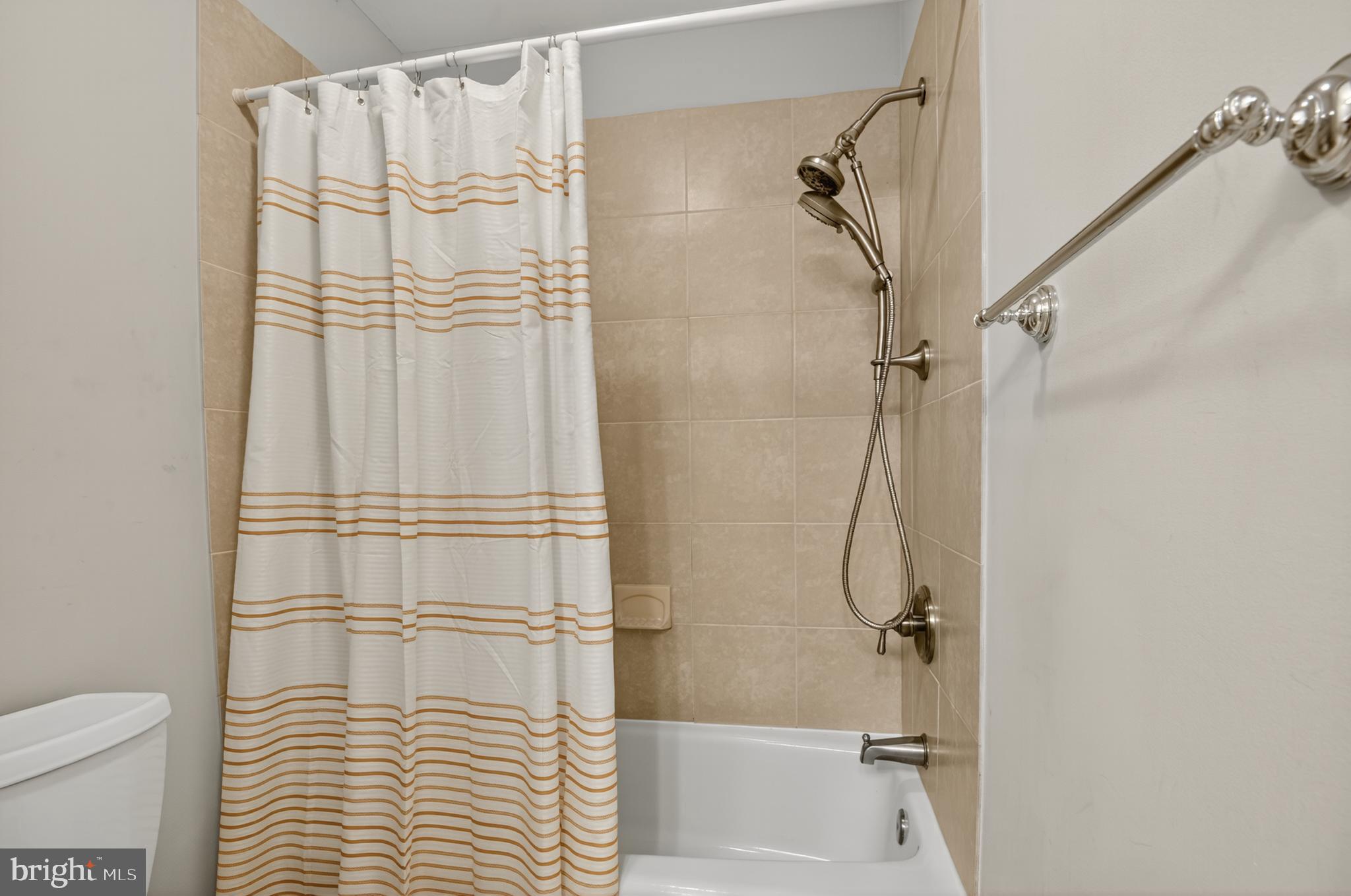 5 Turnham Court Gaithersburg, MD 20878 - Photo 20 of 56 a bathroom with a shower