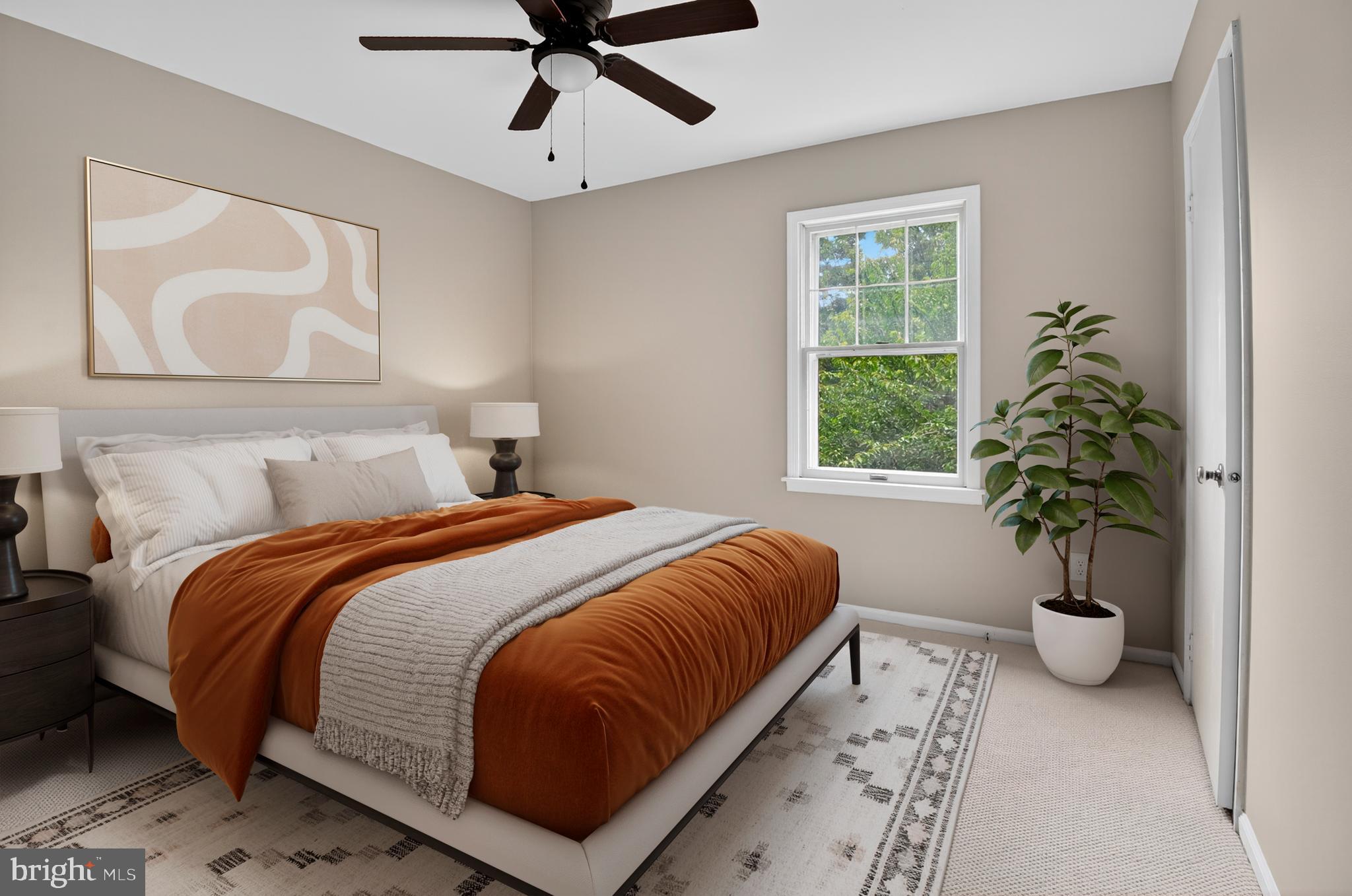 5 Turnham Court Gaithersburg, MD 20878 - Photo 23 of 56 a bedroom with a bed and a potted plant