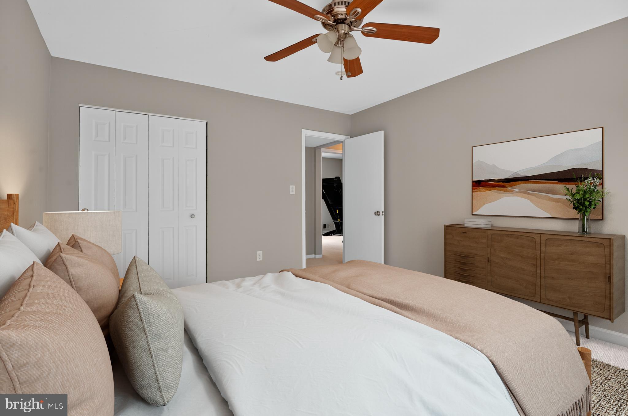 5 Turnham Court Gaithersburg, MD 20878 - Photo 26 of 56 a bedroom with a bed and a chandelier