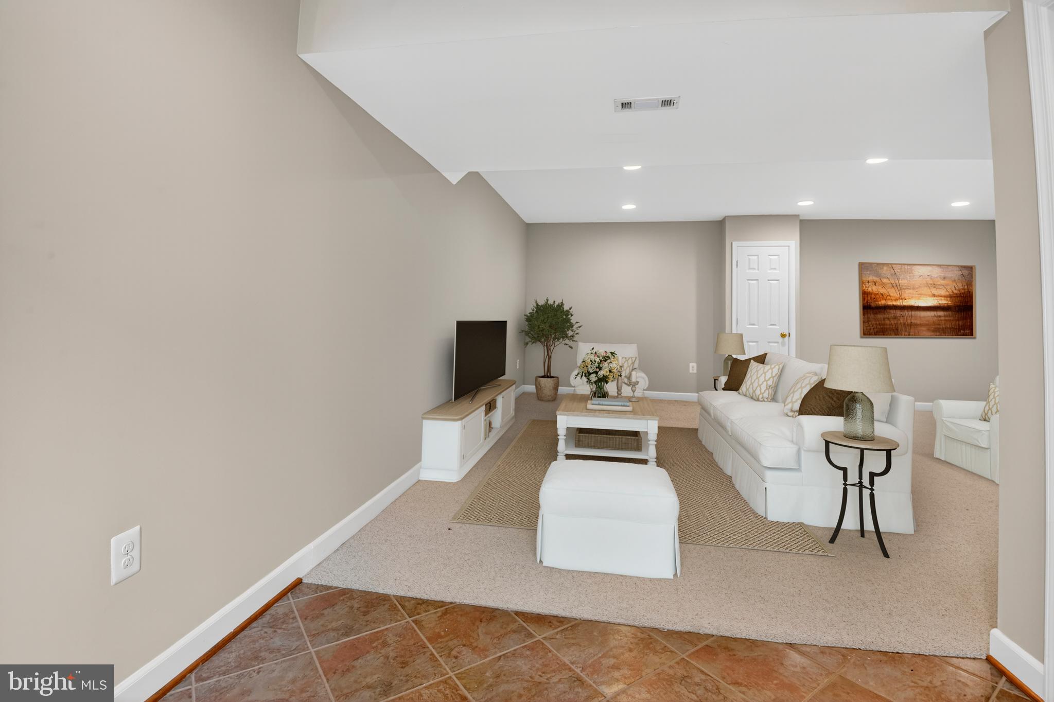 5 Turnham Court Gaithersburg, MD 20878 - Photo 30 of 56 a living room with furniture and a flat screen tv
