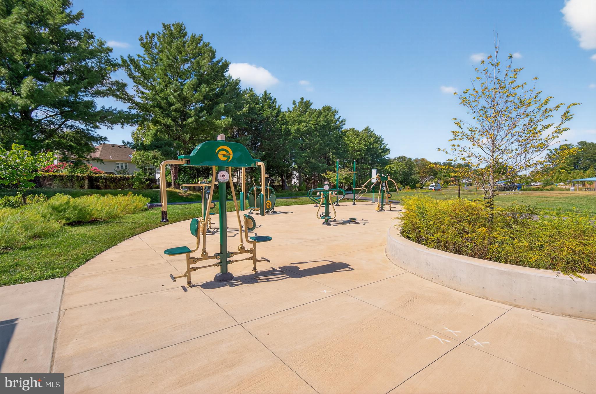 5 Turnham Court Gaithersburg, MD 20878 - Photo 48 of 56 a view of a park with swings and slides