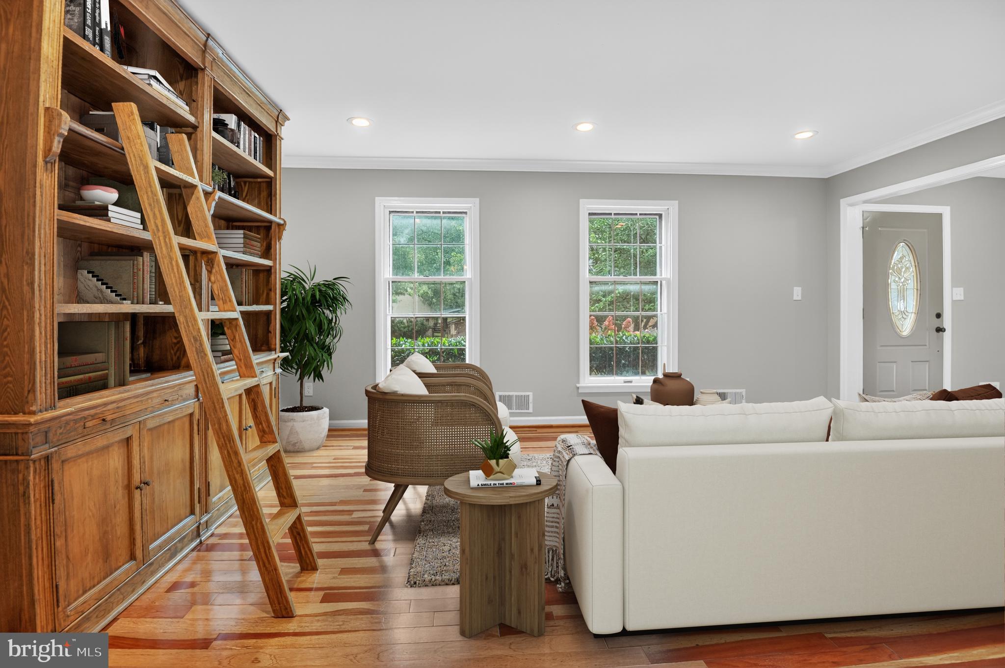 5 Turnham Court Gaithersburg, MD 20878 - Photo 5 of 56 a living room with furniture and a floor to ceiling window