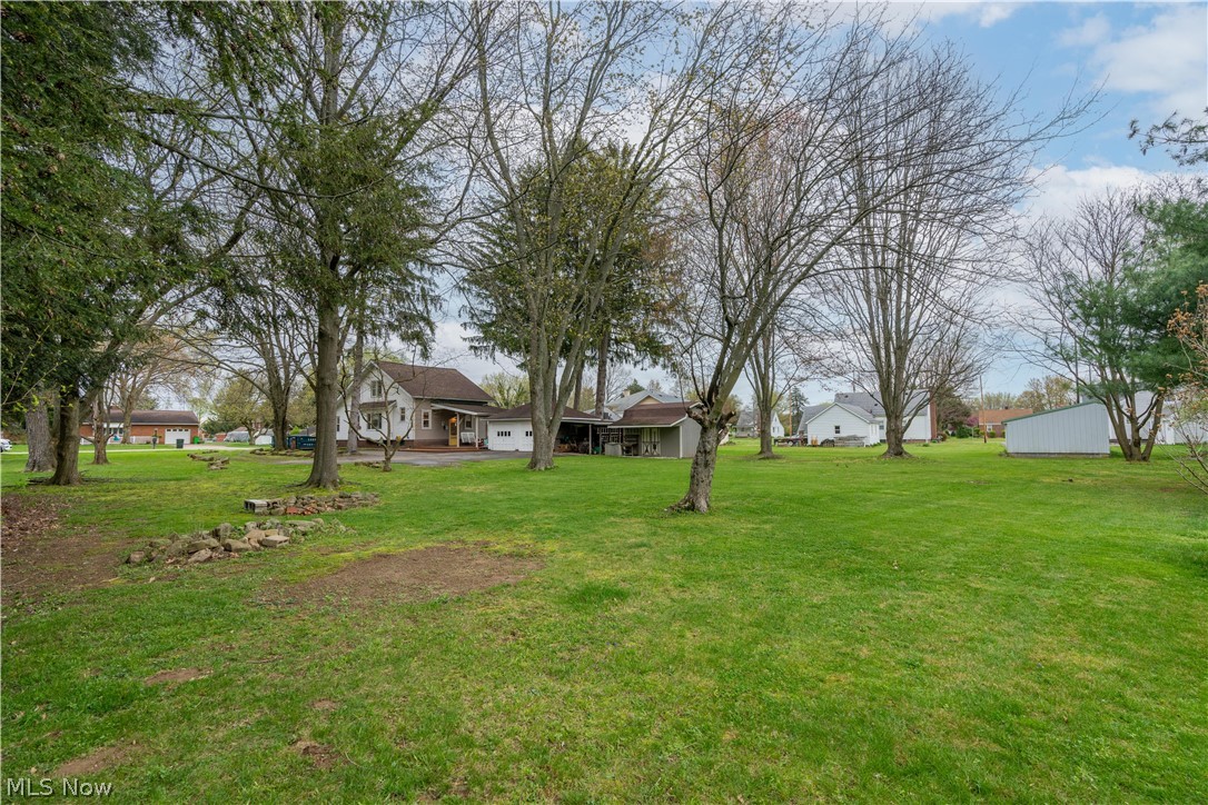 120 34th Street Southwest Canton, OH 44706 - Photo 29 of 30 View of yard with a garage