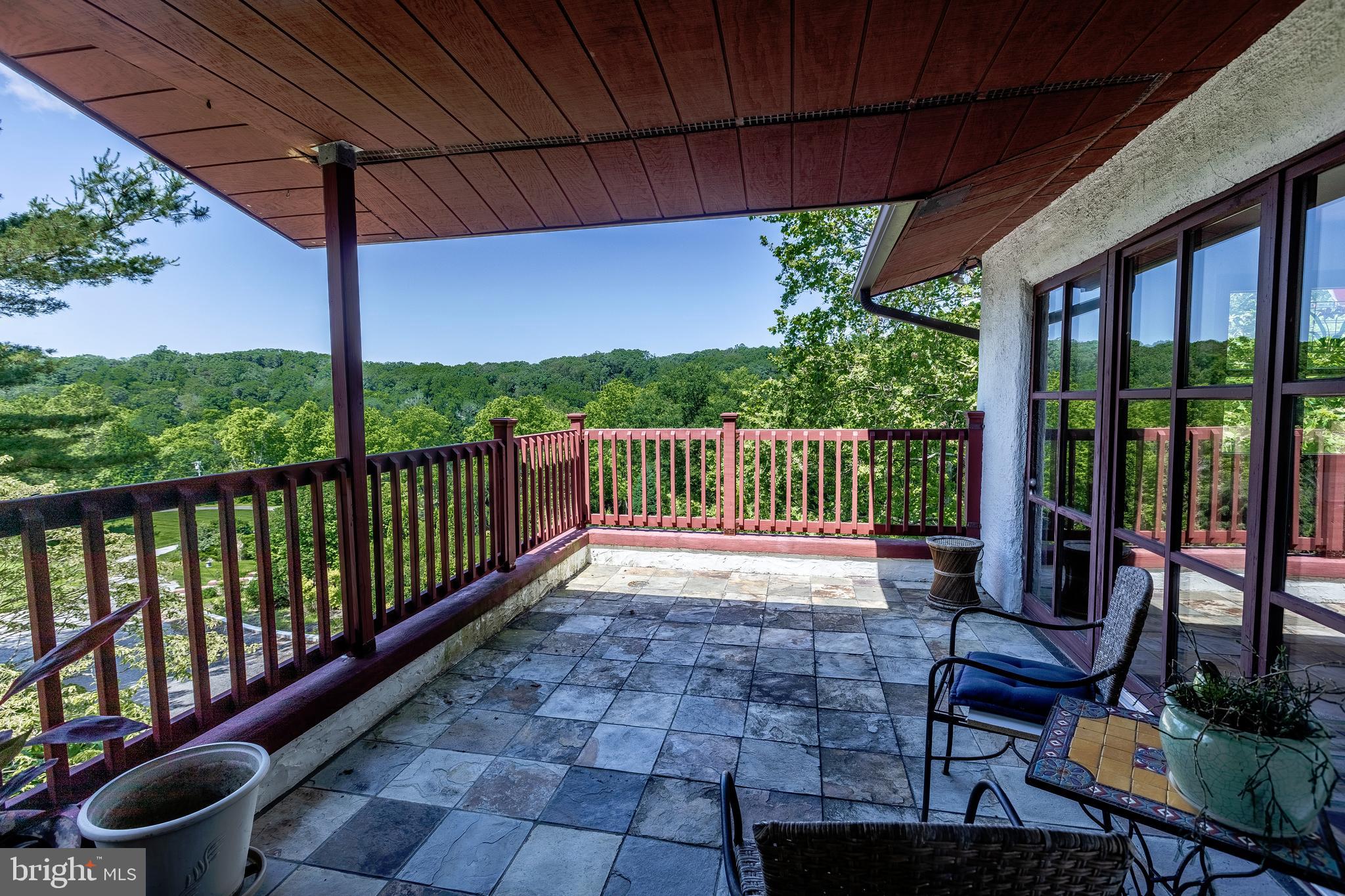 2904 Carrollton Road Finksburg, MD 21048 - Photo 27 of 54 a view of a patio with wooden floor chairs and a table