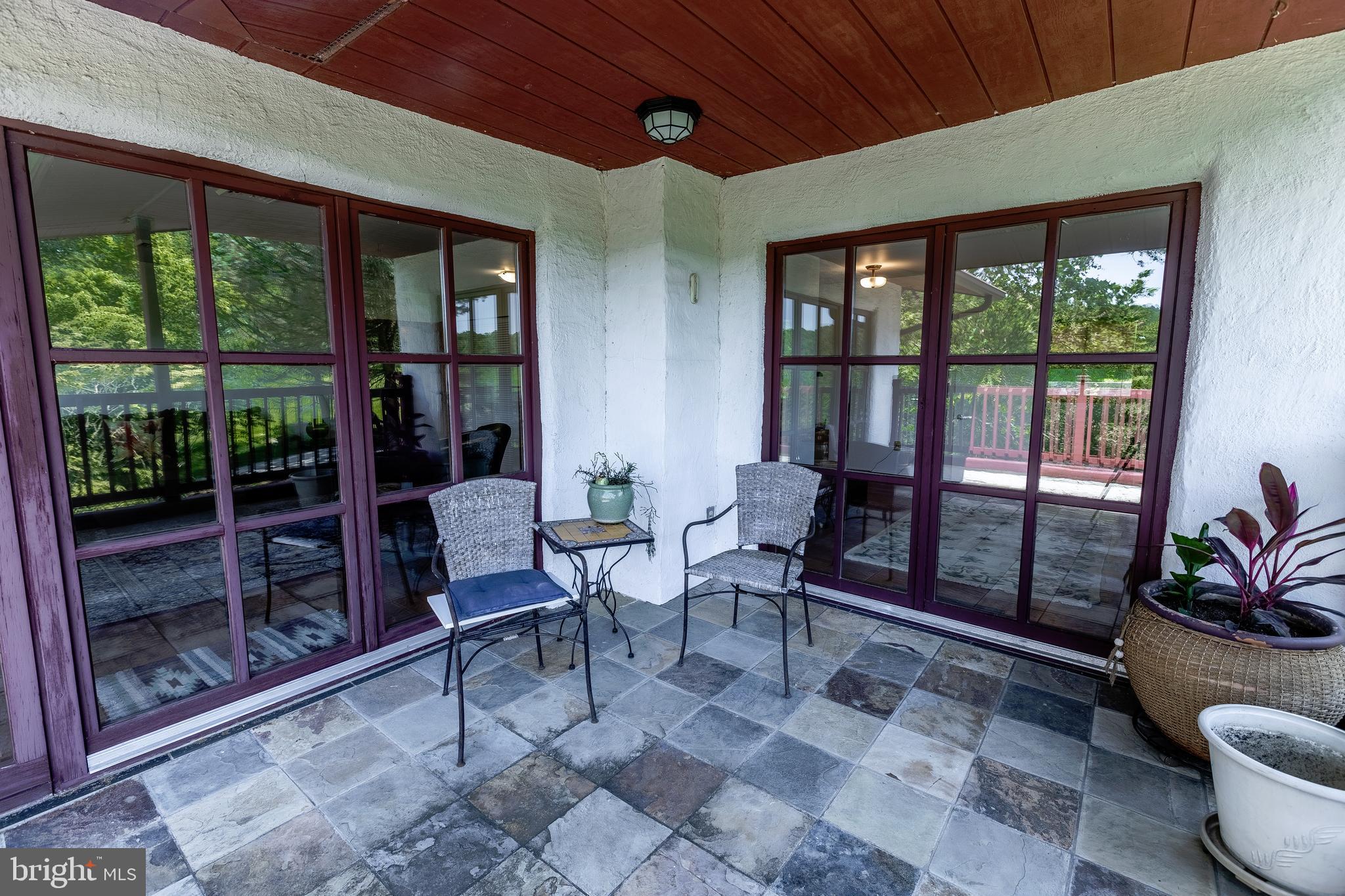 2904 Carrollton Road Finksburg, MD 21048 - Photo 28 of 54 a living room with furniture and a floor to ceiling window