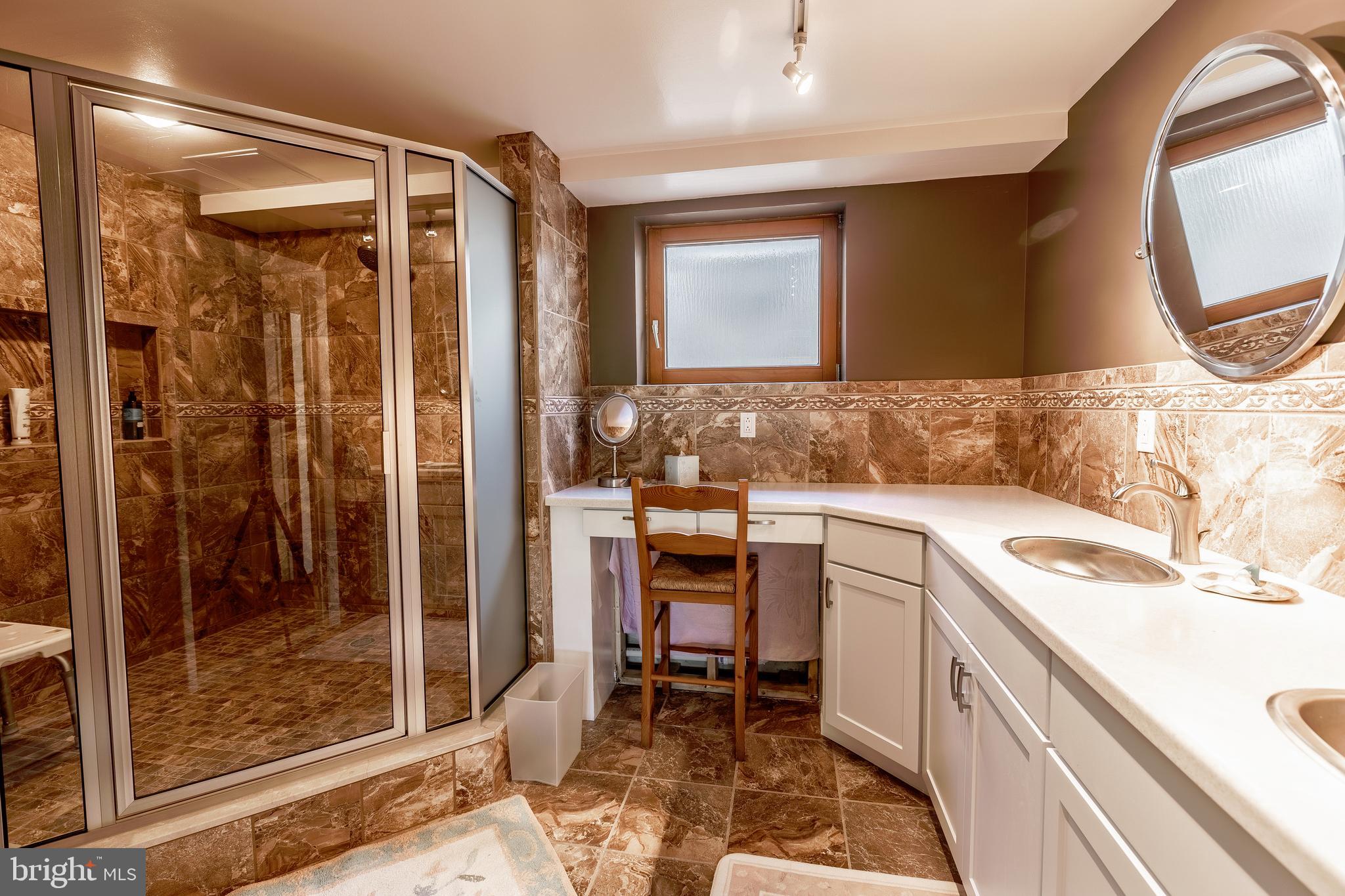 2904 Carrollton Road Finksburg, MD 21048 - Photo 40 of 54 a bathroom with a sink and a mirror