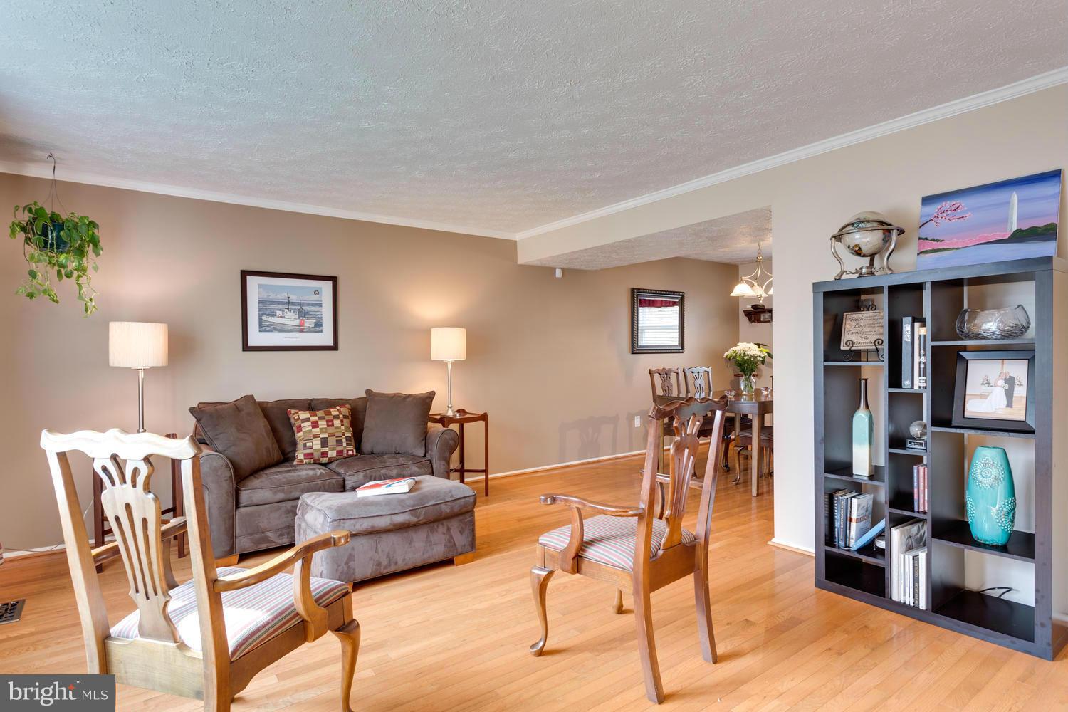 8336 Magic Leaf Road Springfield, VA 22153 - Photo 2 of 30 Spacious Living Room with Wood Floors