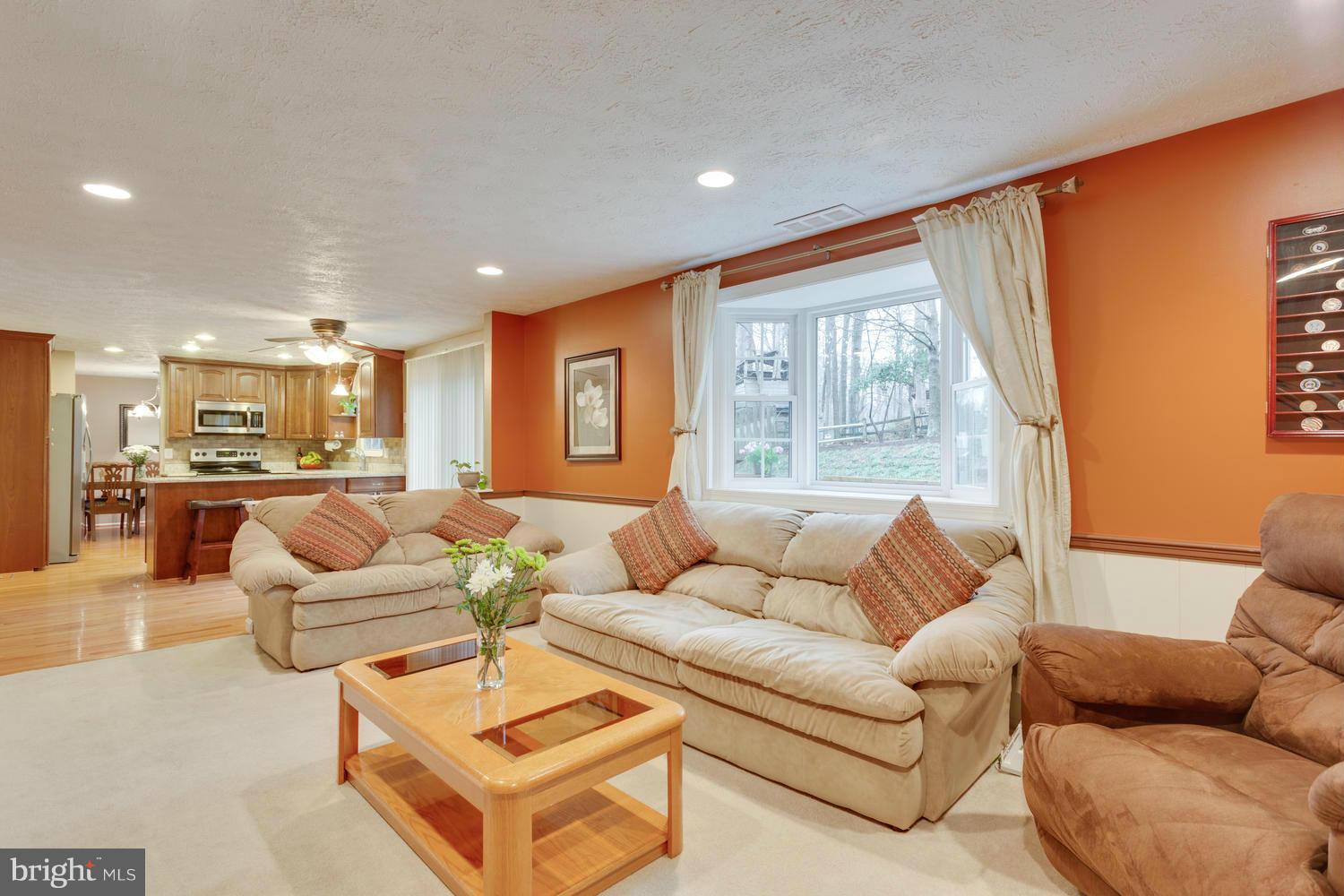 8336 Magic Leaf Road Springfield, VA 22153 - Photo 11 of 30 Family Room Open to Kitchen & Walkout to Deck