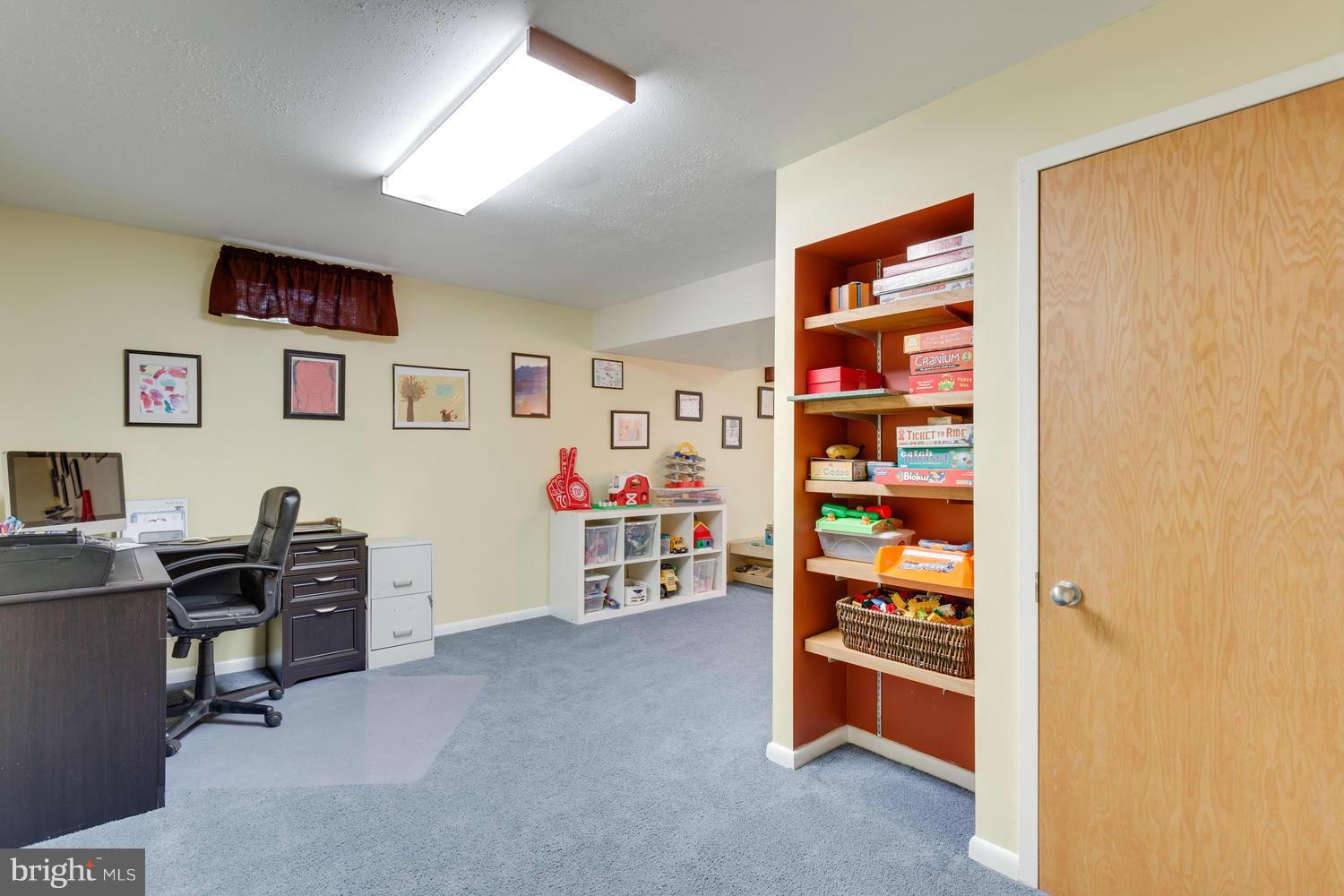 8336 Magic Leaf Road Springfield, VA 22153 - Photo 22 of 30 Lower Level Recreation Room Built Ins