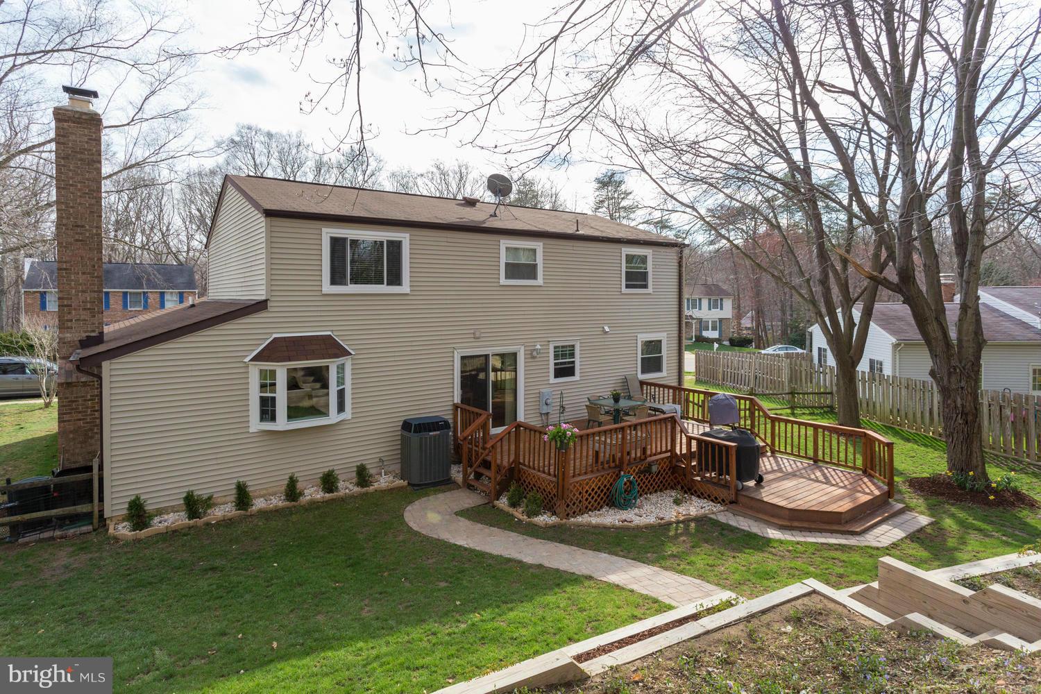 8336 Magic Leaf Road Springfield, VA 22153 - Photo 26 of 30 View of Back of Home & Deck from Terraced Yard