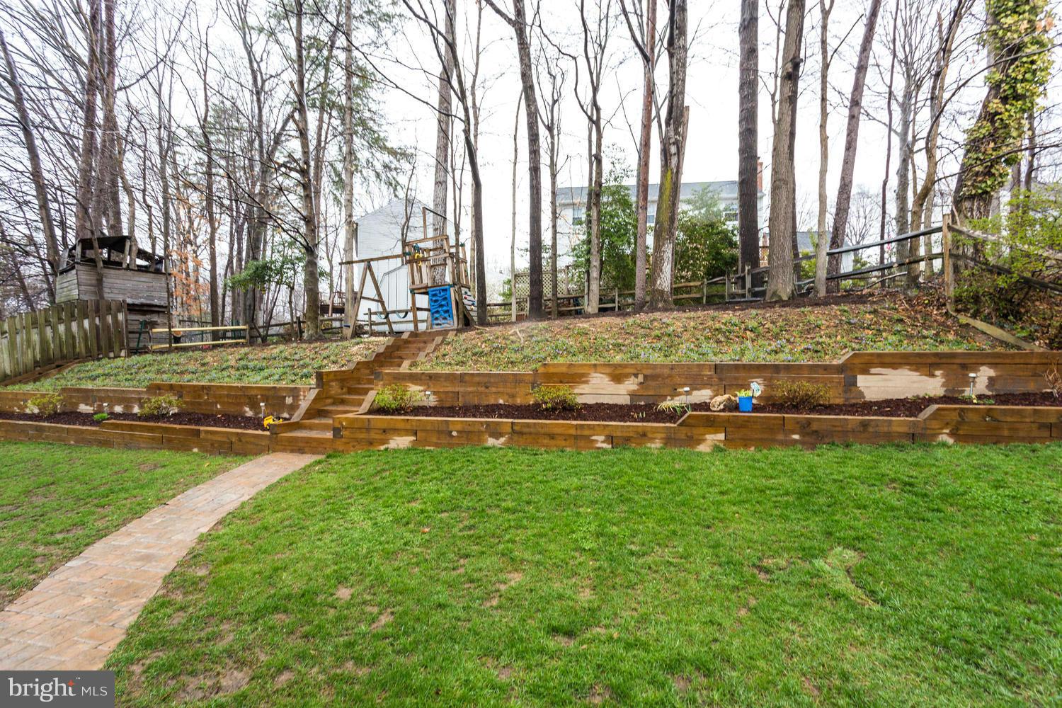 8336 Magic Leaf Road Springfield, VA 22153 - Photo 29 of 30 Yard With Retaining Wall Adds Play Area