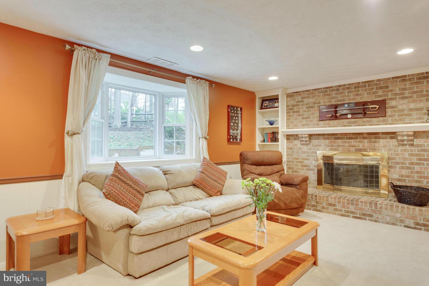 8336 Magic Leaf Road Springfield, VA 22153 - Photo 10 of 30 Family Room with Wall to Wall Stone Fireplace