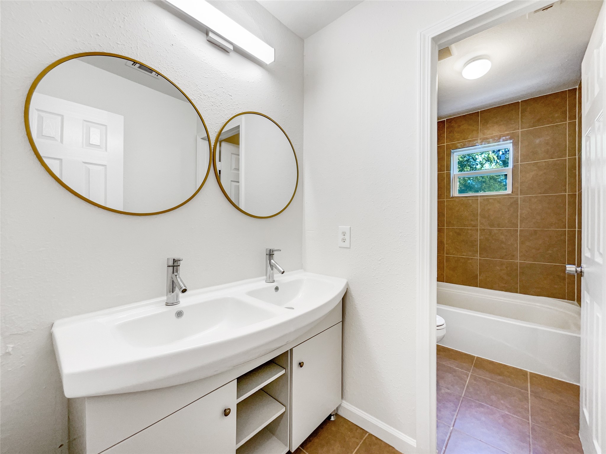 3407 Peachstone Place Spring, TX 77389 - Photo 16 of 17 a bathroom with a sink and a mirror