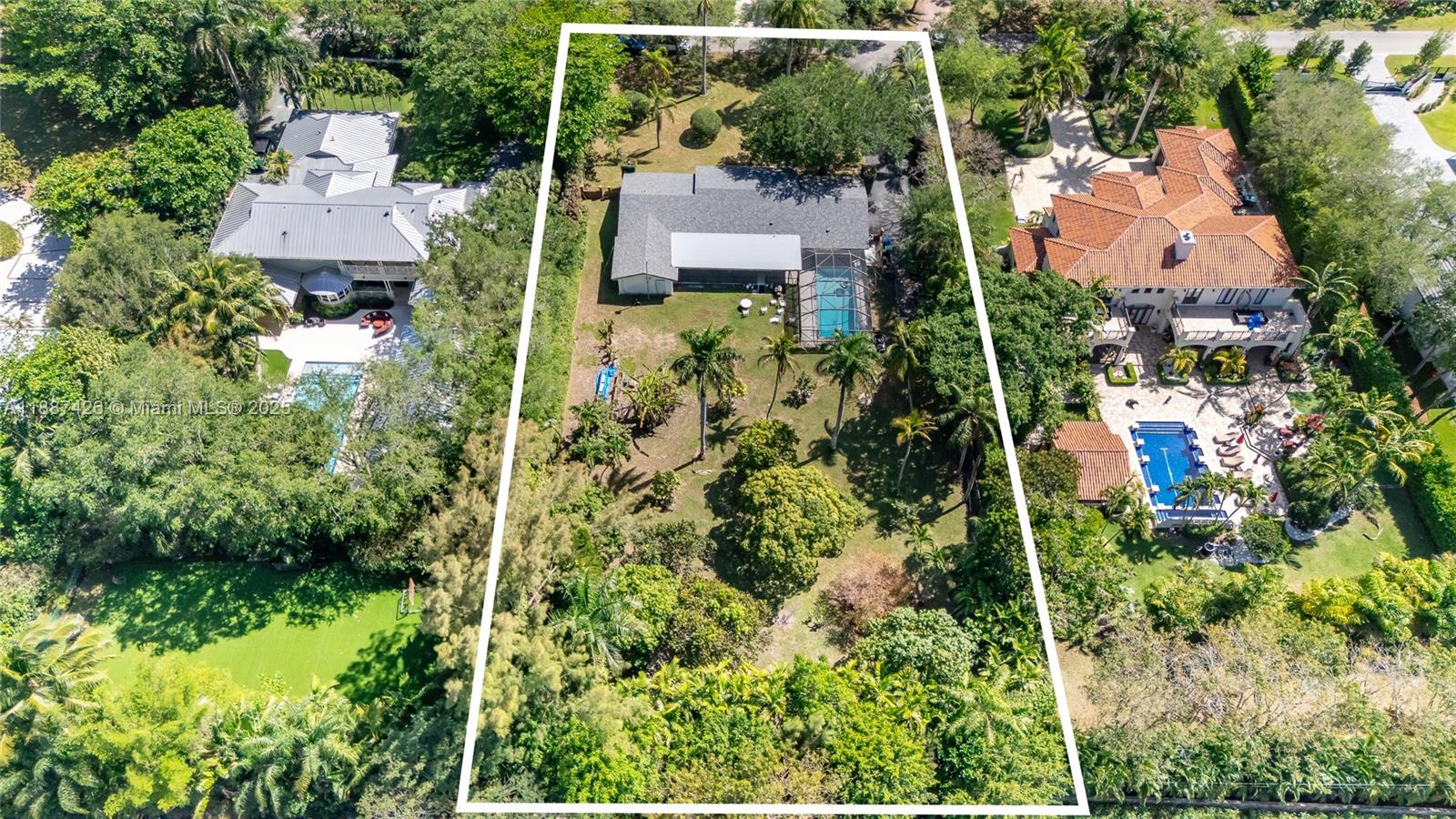 7485 Southwest 122nd Street Pinecrest, FL 33156 - Photo 3 of 12 an aerial view of residential house with outdoor space and trees all around