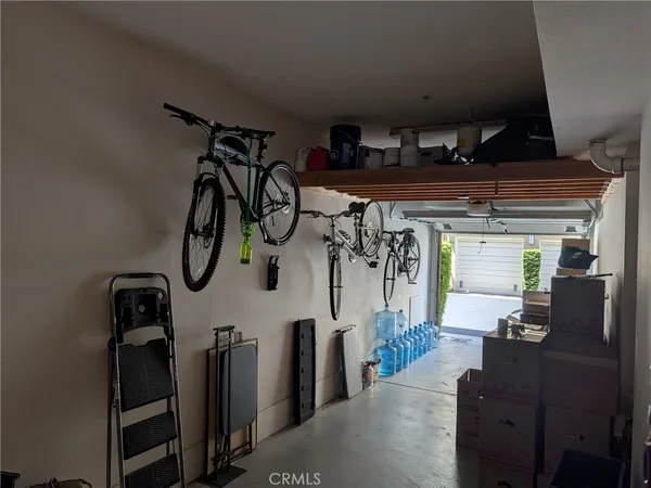 a pathway of a house with a yard