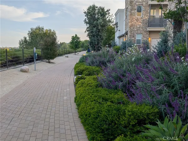 a view of a backyard with a patio and outdoor seating