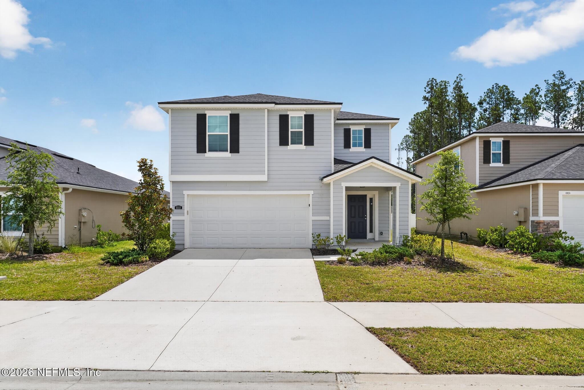 4818 Morning Rise Circle Jacksonville, FL 32218 - Photo 1 of 33 01_4818_Morning_Rise_Cir-Exterior-8461