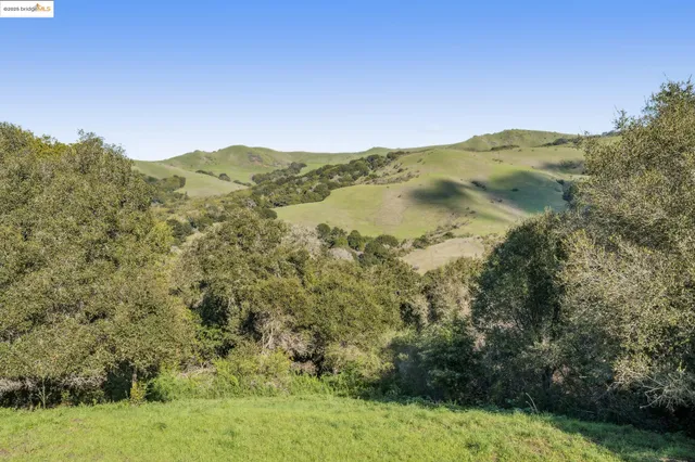 a view of lake with mountain